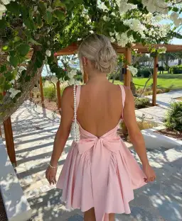 House of CB Florianne Bow Mini Dress in Soft Peach Size XS / AU 6 for rent on The Volte - image 2