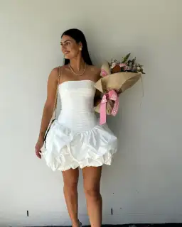 Aje Violette Bubble Hem Mini Dress in Ivory Size AU 10 for rent on The Volte - image 5