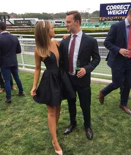 Alex Perry black mini size 4