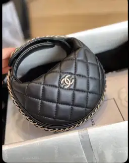 Chanel halfmoon pouch  for rent on The Volte - image 1