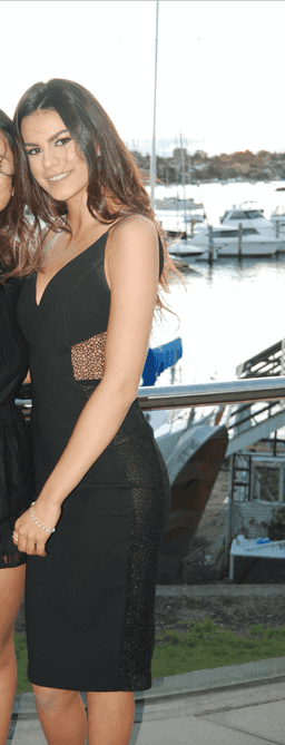 Black knee length Nicholas dress with mesh side cut outs