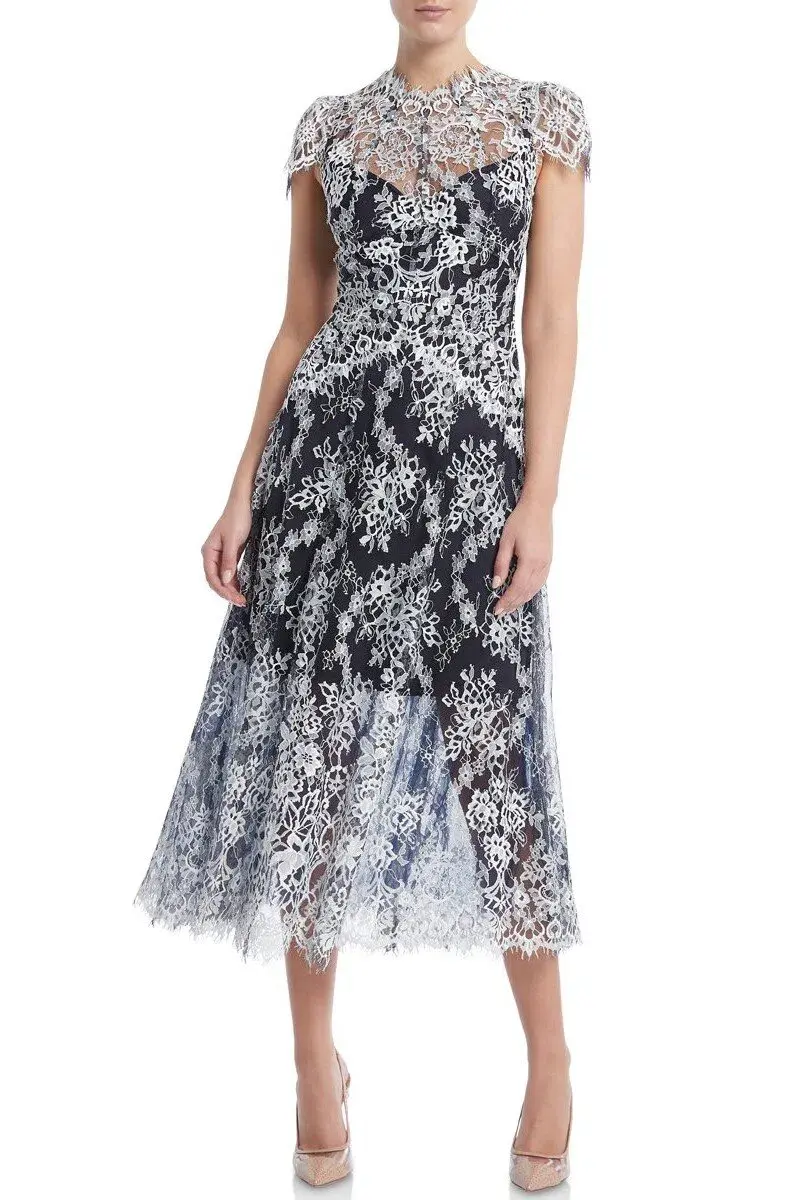 Moss and Spy Natalie Dress in Midnight White Size 16 for rent on The Volte - main image