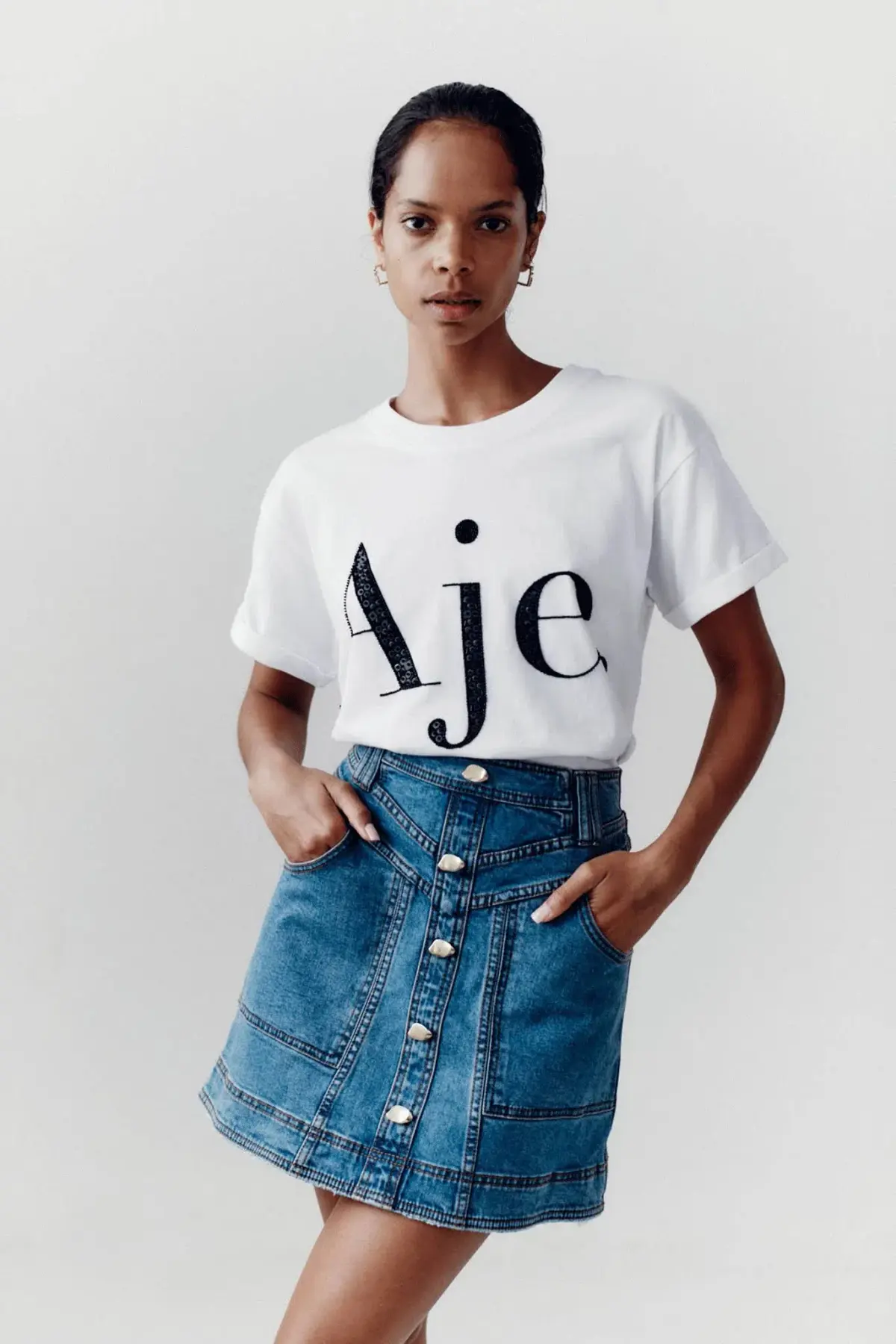 Aje Belmond Mini Skirt in Denim Blue Size 8 and Logo Tee White Print Size 6 Set - Image 1
