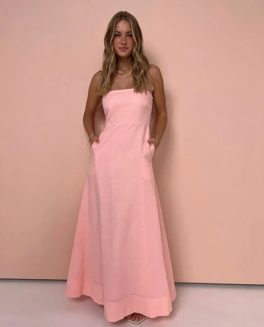 By Nicola Wavy Strapless Maxi Dress Rockmelon Size 16 for rent on The Volte - main image