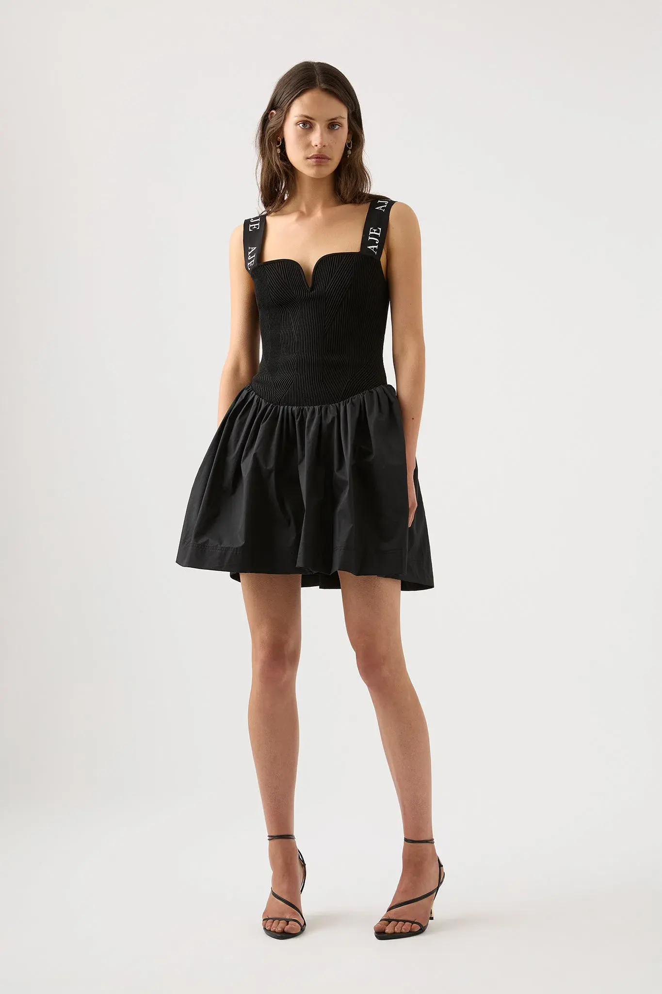 Aje Mira Logo Strap Tulip Mini Dress in Black - Size S - Image 1
