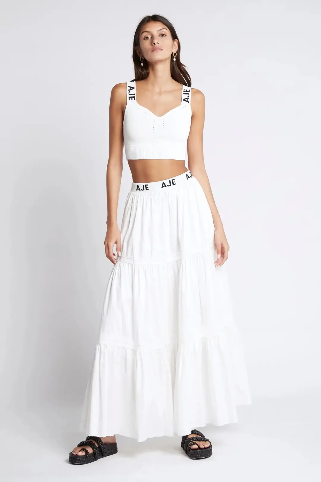 Aje Bardot Logo Tiered Midi Skirt White Size 6 for rent on The Volte - main image
