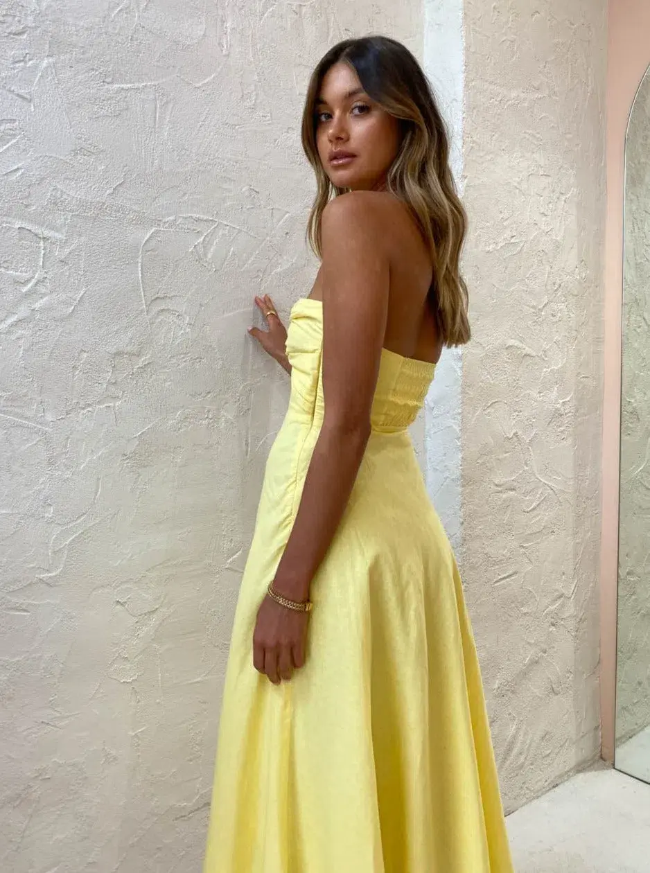 By Johnny Penelope Strapless Midi Dress Yellow Size 6 for rent on The Volte - main image