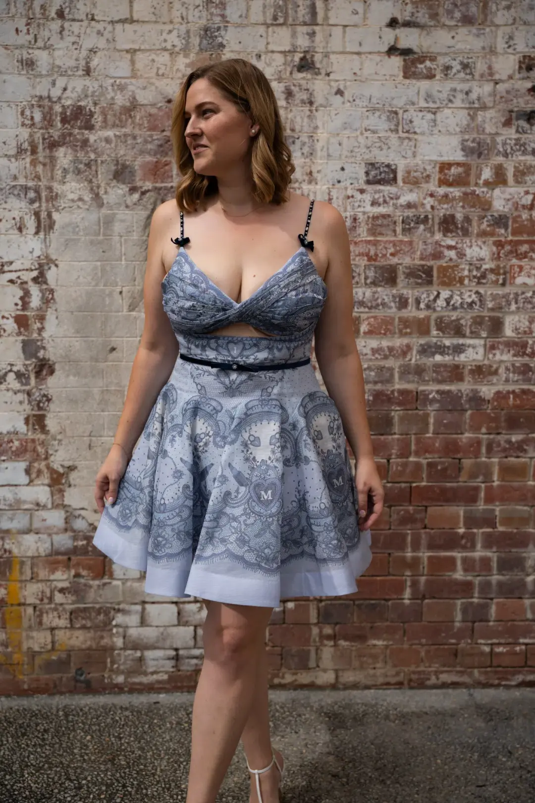 Zimmermann Crush Twist Front Mini Dress Print Size 4 / Aus 16 for rent on The Volte - main image