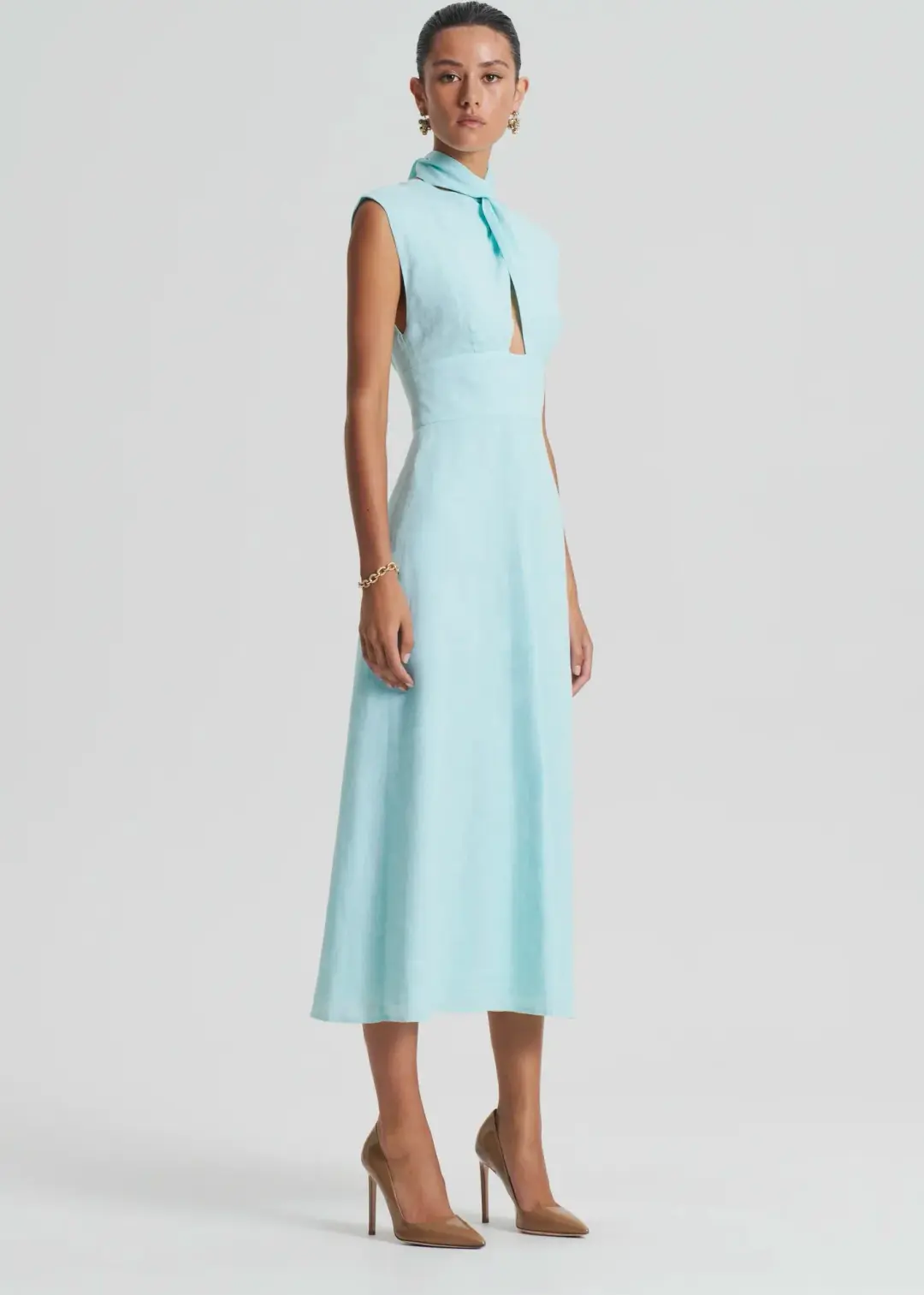 Scanlan Theodore Italian Linen Turban Twist Dress in Turquoise Size 8 for rent on The Volte - main image
