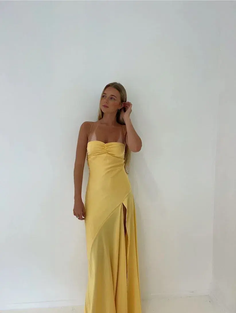 HNTR the Label Gaia Gown in Gold Sun Size S/AU8 for rent on The Volte - main image