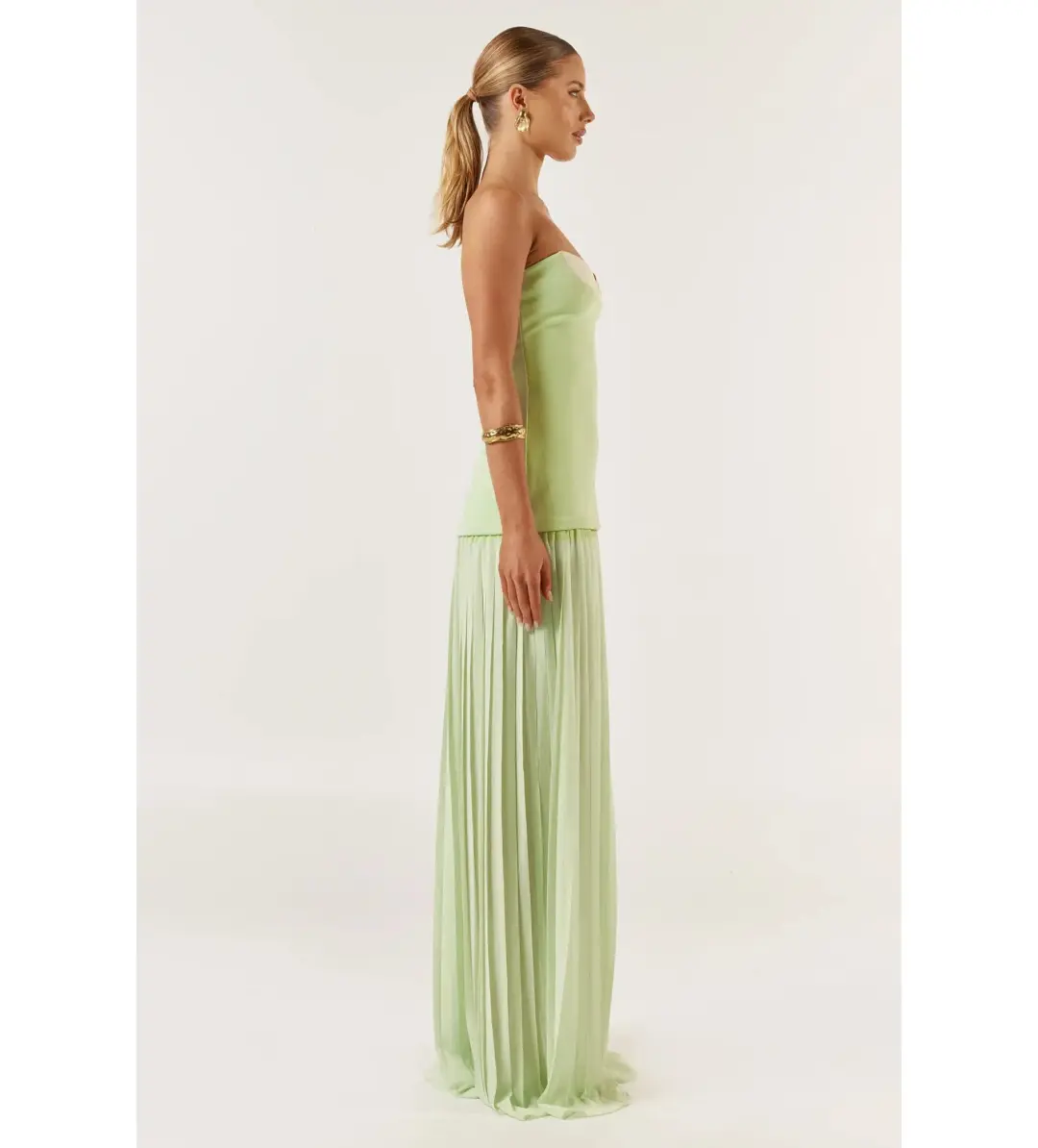 She is OLLÁ Nicolette Maxi Dress Green Size M/AU 10 for rent on The Volte - main image