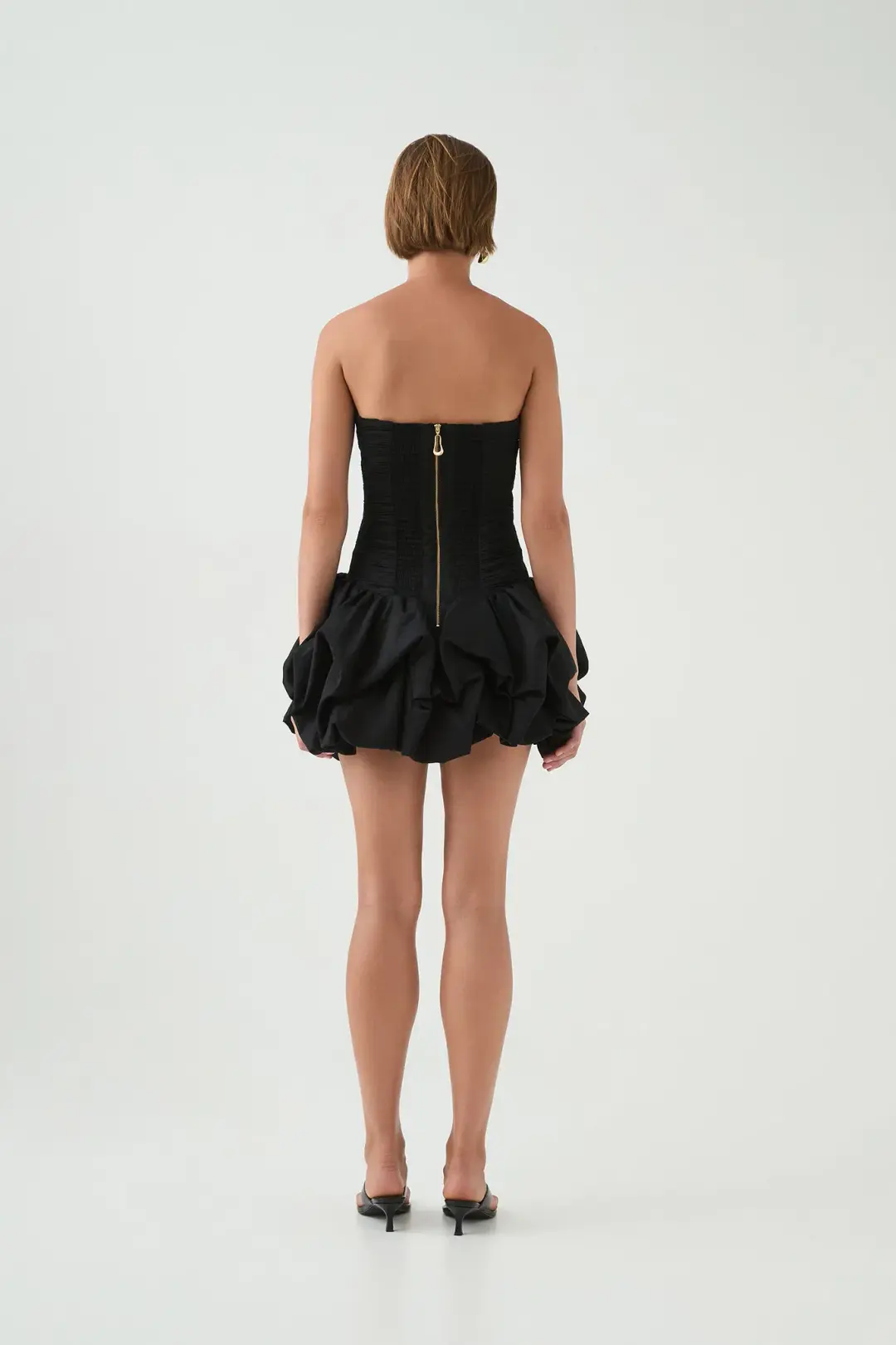 Aje Violette Bubble Hem Mini Dress in Black Size 8 for rent on The Volte - main image