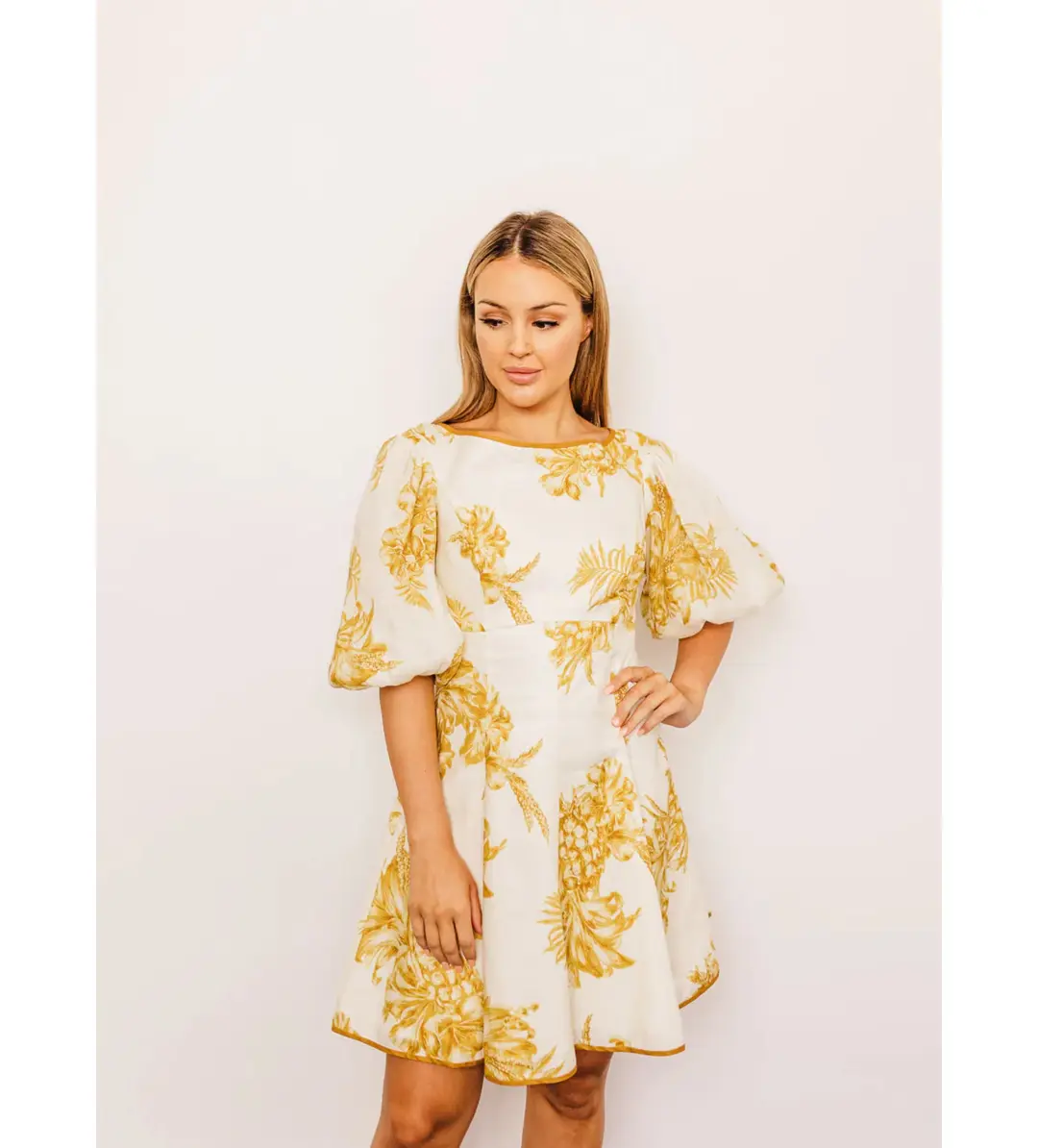 Zimmermann Empire Linen Puff Sleeve Mini Dress in Gold Size 0 /AU 8  for rent on The Volte - main image