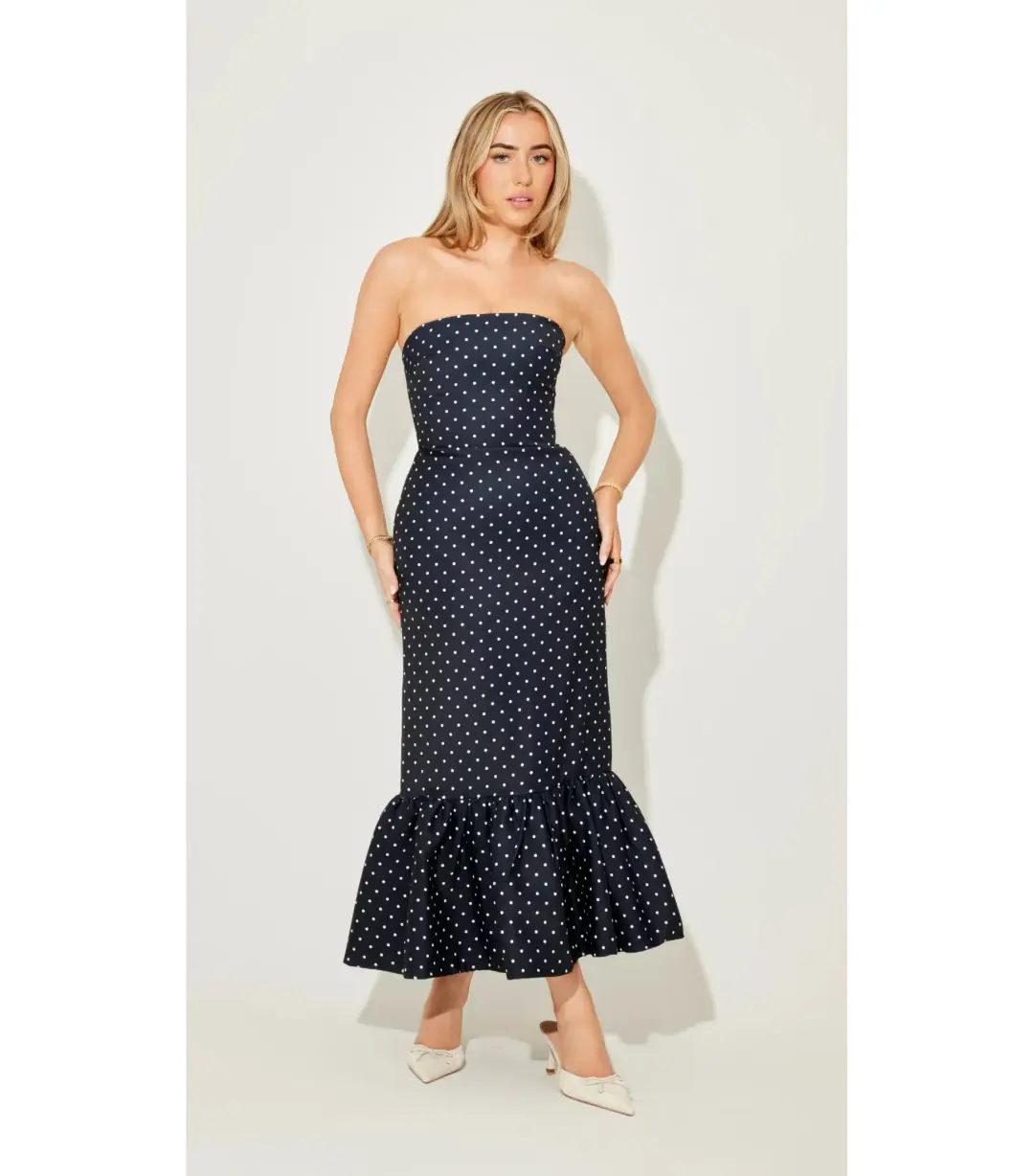 Odd Muse Strapless Peplum Midi Dress in Navy Polka Dot Size M / AU 10 for rent on The Volte - main image