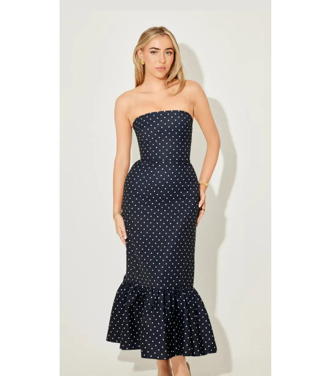 Odd Muse Strapless Peplum Midi Dress in Navy Polka Dot Size M / AU 10 for rent on The Volte - main image