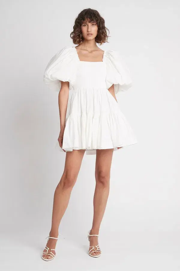 Aje Casa Puff Sleeve Mini Dress in Ivory Size AU 6 / XS for rent on The Volte - main image