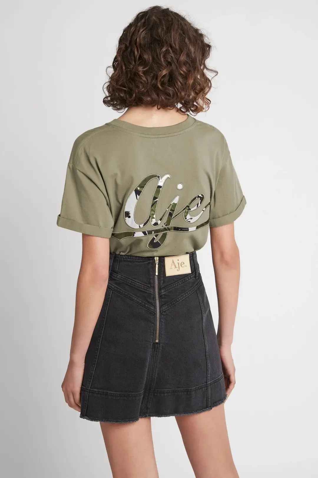 Aje Cole Denim Mini Skirt Black Size 12 for rent on The Volte - main image