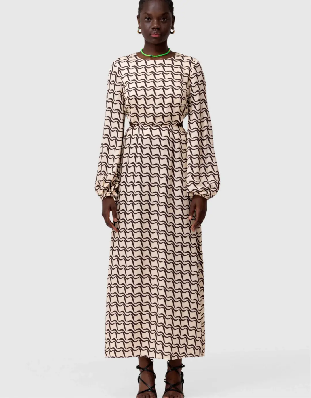 The Wolf Gang Marrakesh Cut Out Dress Black Wave Print Size 10 for rent on The Volte - main image