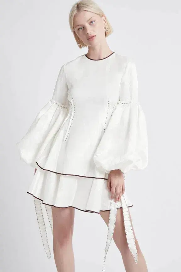 AJE Gracious Tiered Mini Dress Ivory Size 8  for rent on The Volte - main image
