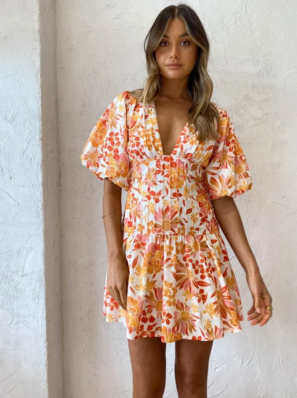 By Nicola Fiesta Stitch Waist Mini Dress in Holiday Floret Print Size 12 for rent on The Volte - main image