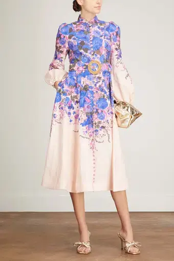 The High Tide Buttoned Midi Dress in Purple Ikat Floral from Zimmermann Resort 2023 Collection, High Tide.

Size 2 / Au 10-12