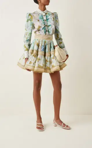 Zimmermann Rhythm Trimmed Mini Skirt in Aqua Mixed Print Floral
Size 6