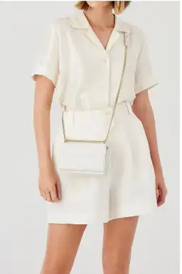 Oroton Forte Micro Clutch in Cream for rent on The Volte - image 3