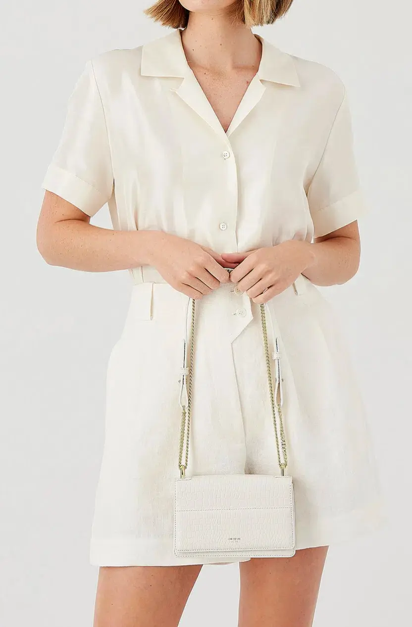 Oroton Forte Micro Clutch in Cream for rent on The Volte - main image