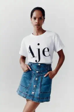 Aje Belmond Mini Skirt in Denim Blue Size 8 and Logo Tee White Print Size 6 Set