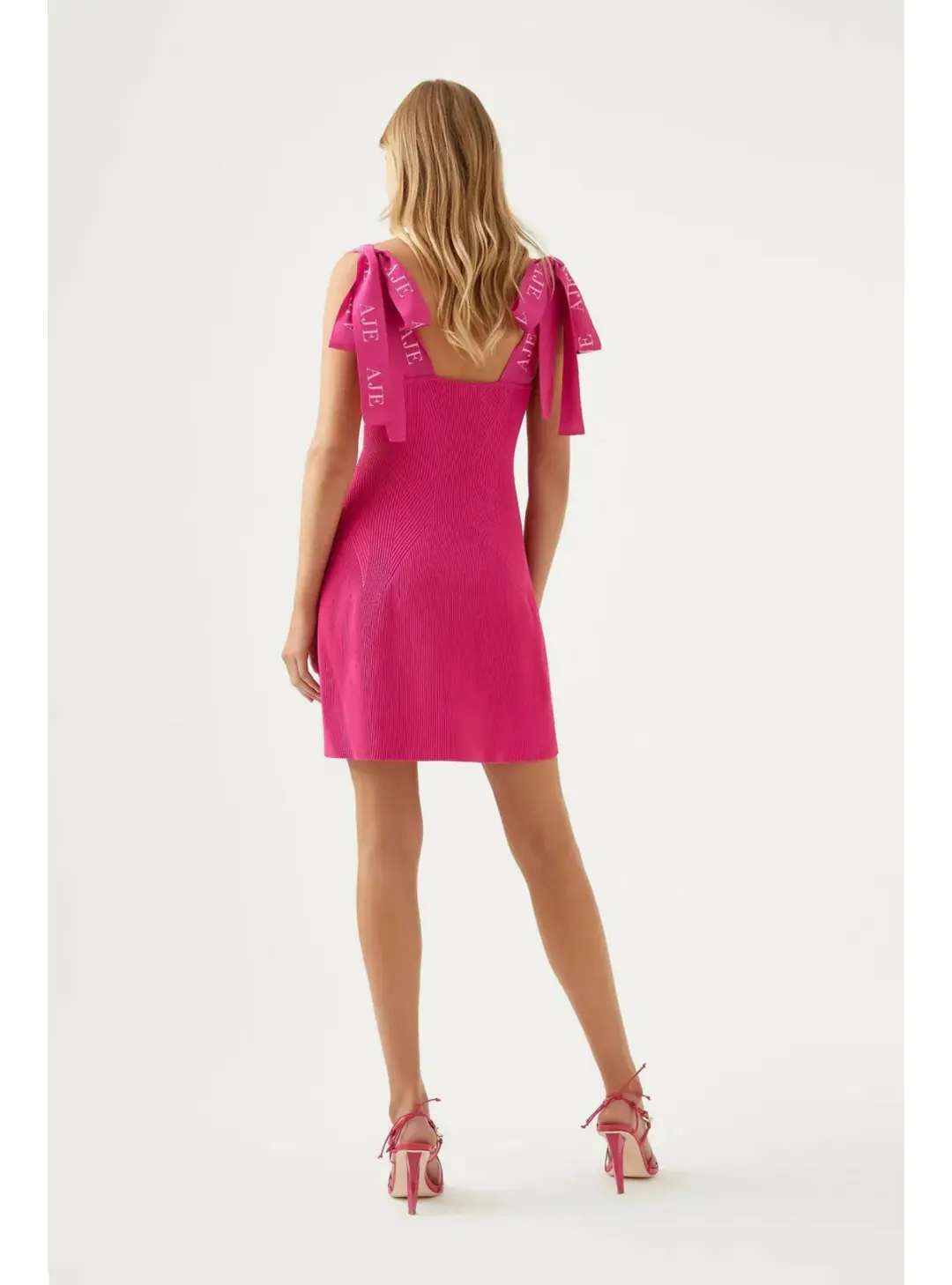 Aje Amber Knit Tie Shoulder Mini Dress Pink Size AU 10 for rent on The Volte - main image