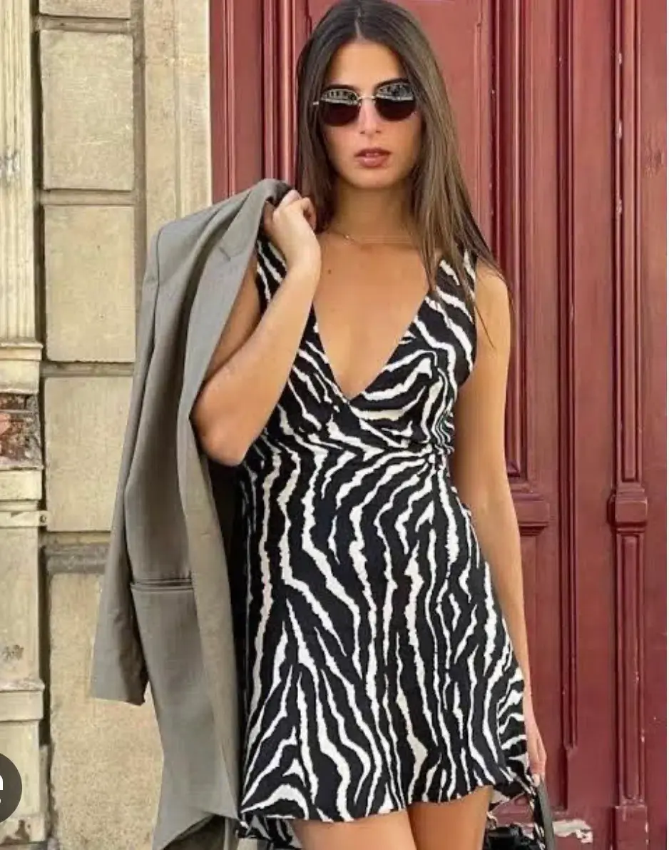 Realisation Par The Isabelli Mini Dress in Animal Size 8 for rent on The Volte - main image