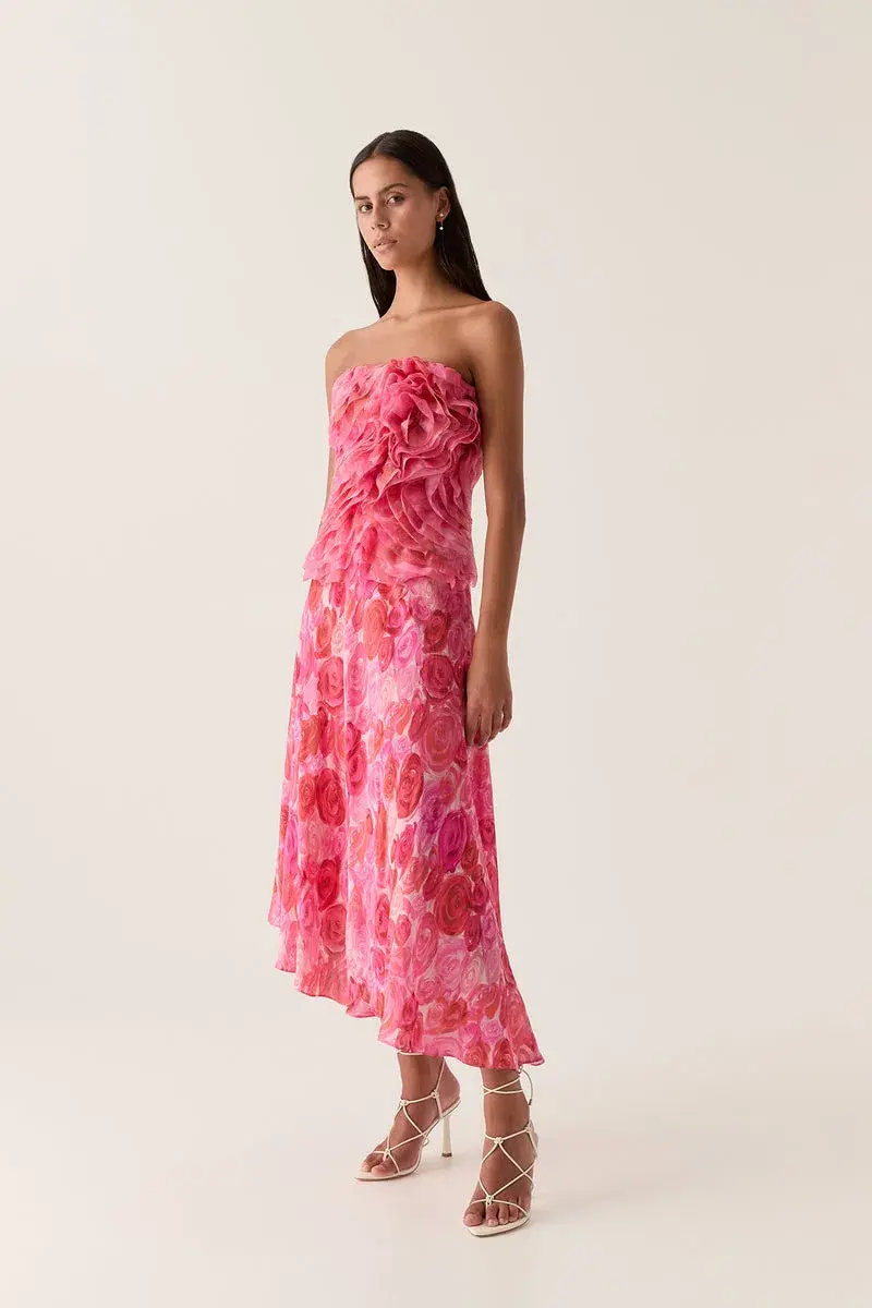 Aje Charmed Rosette Ruffle Bustier and Valeria Asymmetric Midi Skirt Set Misty Rose Size 16 for rent on The Volte - main image