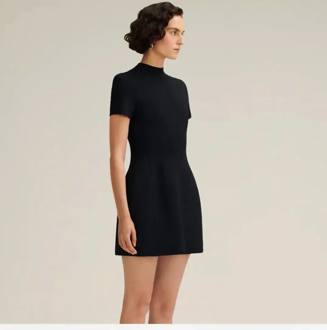 Scanlan Theodore Crepe Knit Peplum Mini Dress Black Size S / AU 8 for rent on The Volte - main image