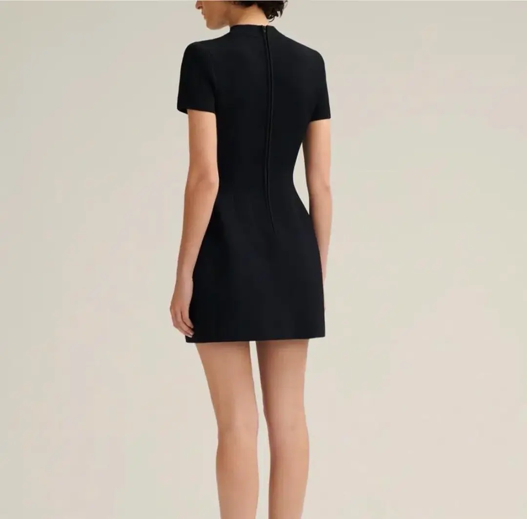 Scanlan Theodore Crepe Knit Peplum Mini Dress Black Size S / AU 8 for rent on The Volte - main image