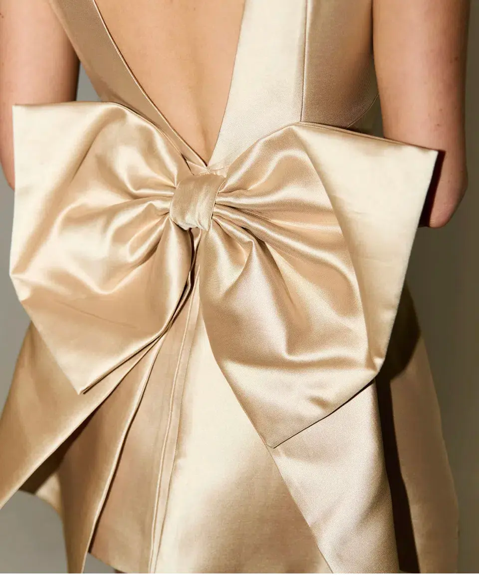 Odd Muse The Ultimate Muse Bow Detail Mini Dress Gold Size 12 for rent on The Volte - main image