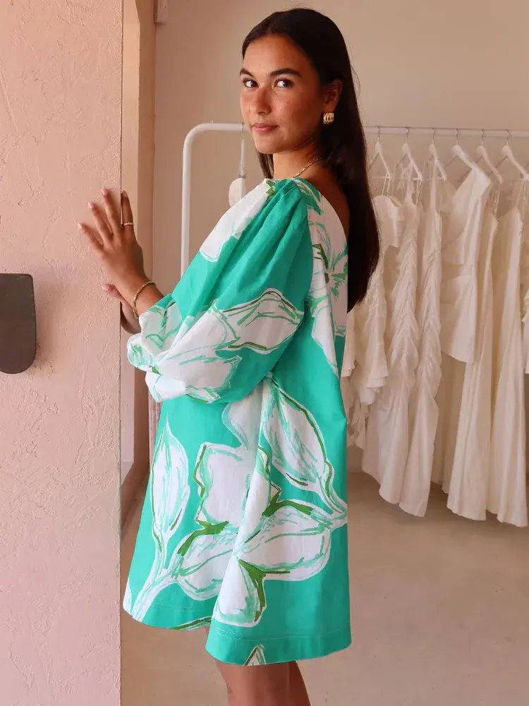 By Nicola Capri Off Shoulder Relaxed Mini Dress in Verde Fleur Size 10 for rent on The Volte - main image