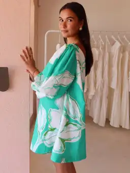 By Nicola Capri Off Shoulder Relaxed Mini Dress in Verde Fleur Size 10 for rent on The Volte - image 4