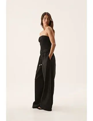 Aje Airlie Relaxed Pants in Black Size AU 8 for rent on The Volte - main image
