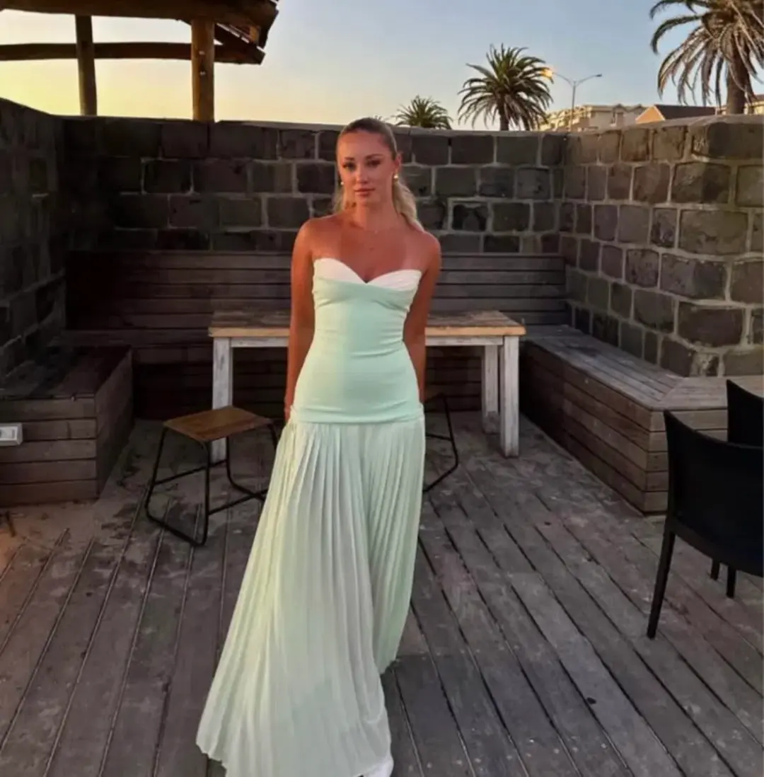 She is OLLÁ Nicolette Maxi Dress Green Size 8 for rent on The Volte - main image