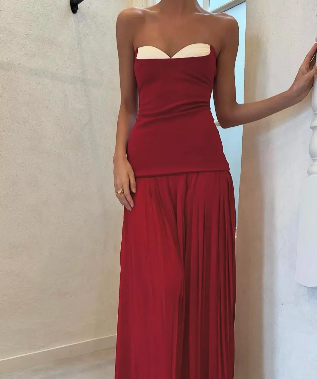 She is OLLÁ Nicolette Maxi Dress in Raspberry Size 6 for rent on The Volte - main image
