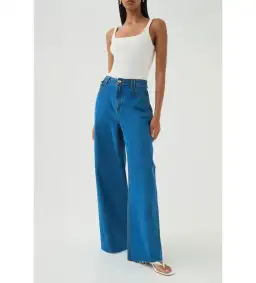 Aje Outline Denim Jeans 70's Wash Size 8 for rent on The Volte - image 1