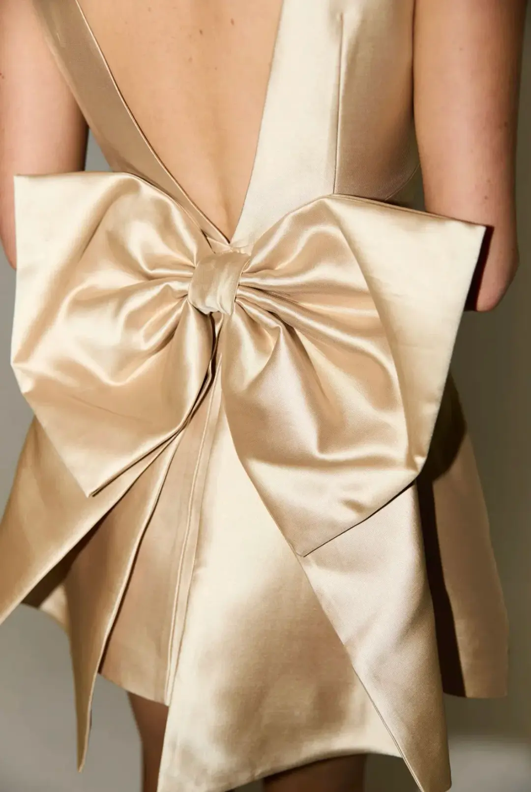 Odd Muse The Ultimate Muse Bow Detail Mini Dress in Gold Size AU10 for rent on The Volte - main image