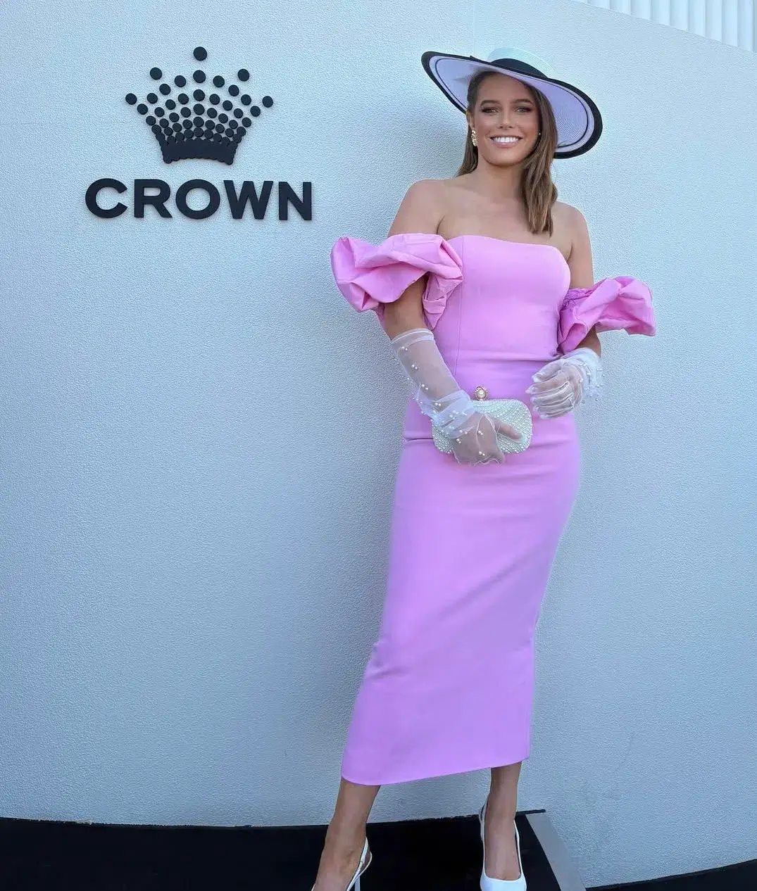 Bianca and Bridgett size 10 pink midi dress with bubble sleeves for rent on The Volte - main image