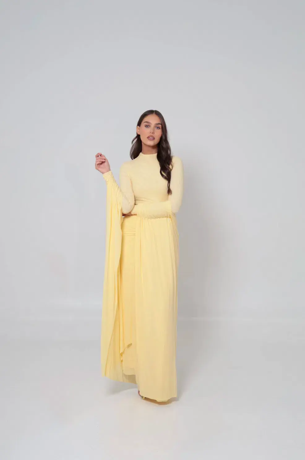 Alaía Muse Azalea Cape Dress in Yellow Size S / AU 8 for rent on The Volte - main image