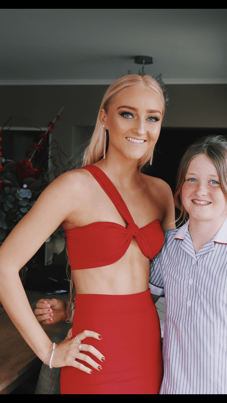 Amy Taylor Red Two Piece for rent on The Volte - main image