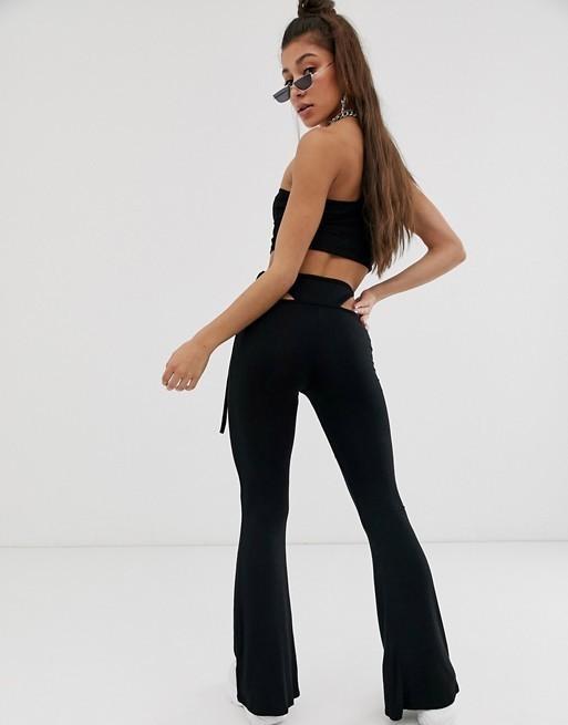 I.AM.GIA O Mighty Tribal G-String Flare Pants Black Size Medium / AU 10 for rent on The Volte - main image