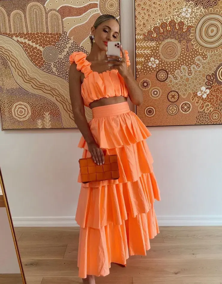 Aje Medina Ruched Crop Top and Tiered Midi Skirt Set Orange Size 6 for rent on The Volte - main image