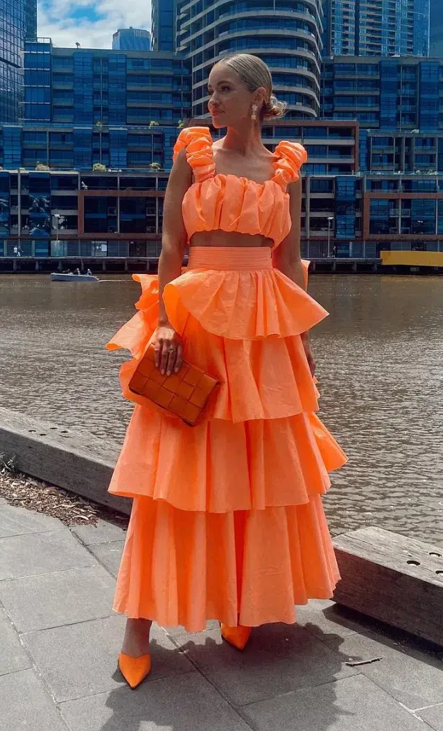 Aje Medina Ruched Crop Top and Tiered Midi Skirt Set Orange Size 10 for rent on The Volte - main image