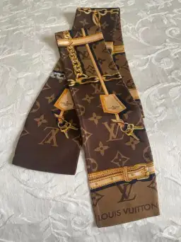 Louis Vuitton Silk Monogram Confidential Bandeau Scarf Brown for rent on The Volte - image 2