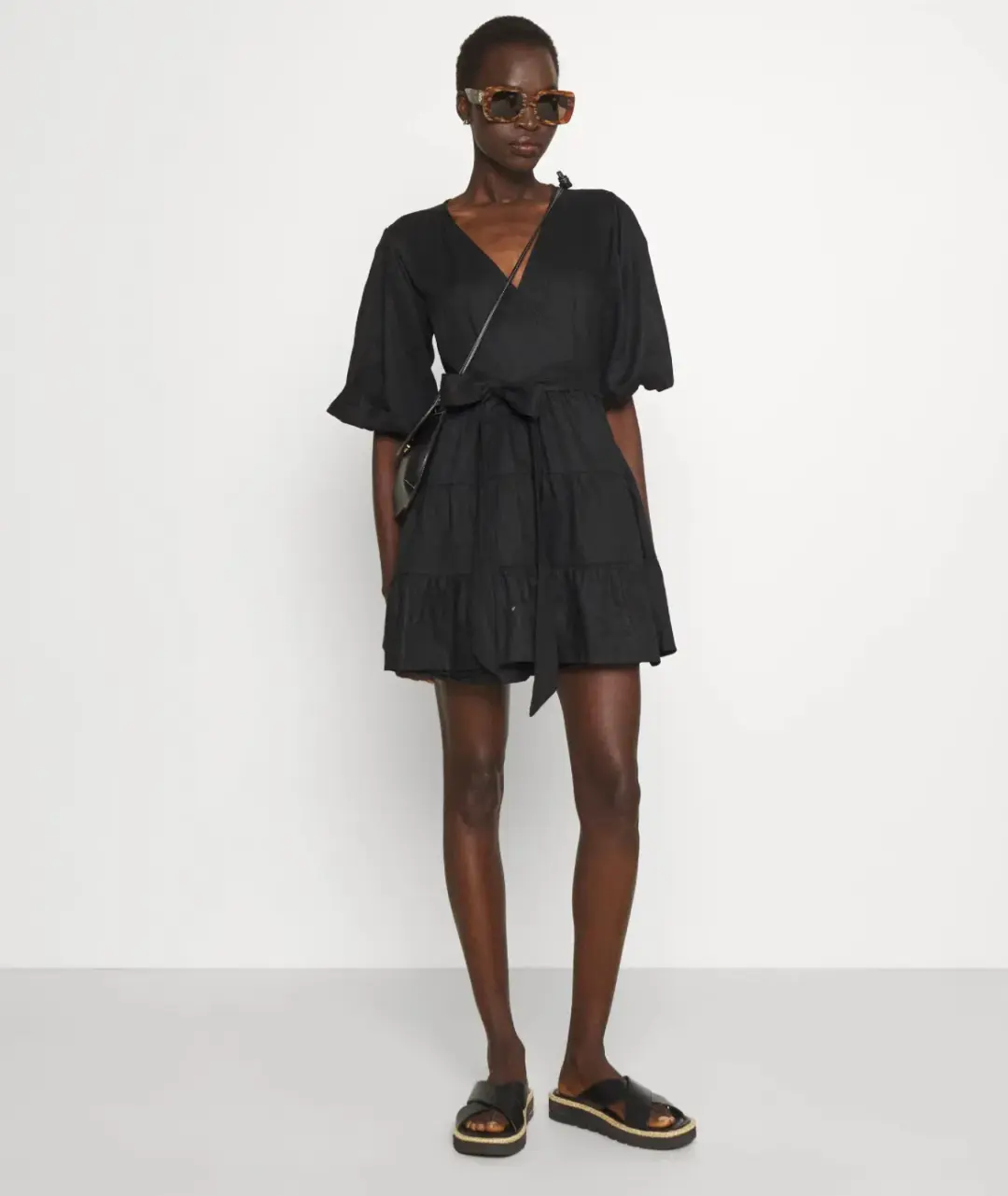 Faithfull the Brand Rooney Wrap Mini Dress Black Size 8 for rent on The Volte - main image